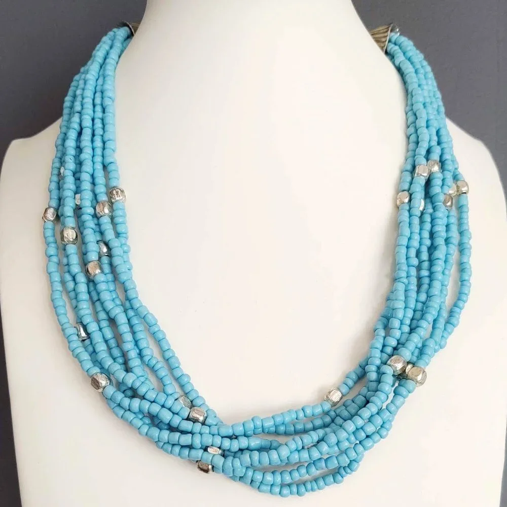 8 strand blue and silver beaded necklace